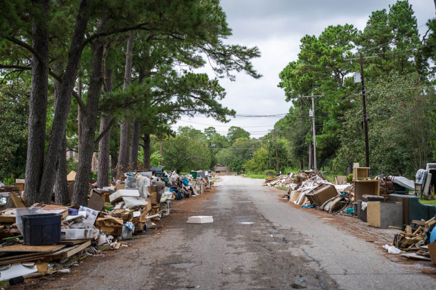 an insurance adjuster surveys damage from harvey